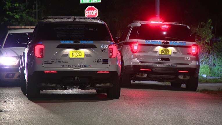 Police cars outside scene where man was shot late Wednesday night. 