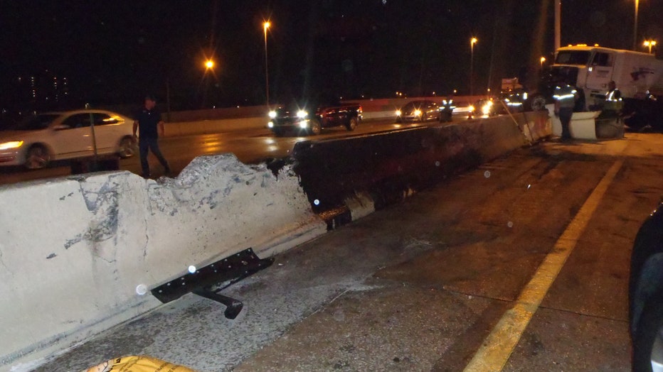 The crash sent a portion of a concrete barrier onto both sides of the interstate. Image is courtesy of the Florida Highway Patrol. 