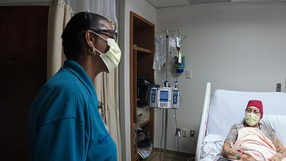 Miss Bettie checks in on a patient at TGH.