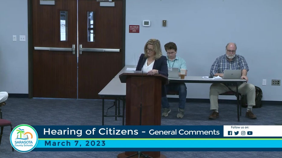 A woman makes a public comment during a Sarasota School Board meeting. 