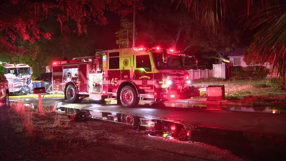 Fire truck outside two homes that caught fire Tuesday morning. 