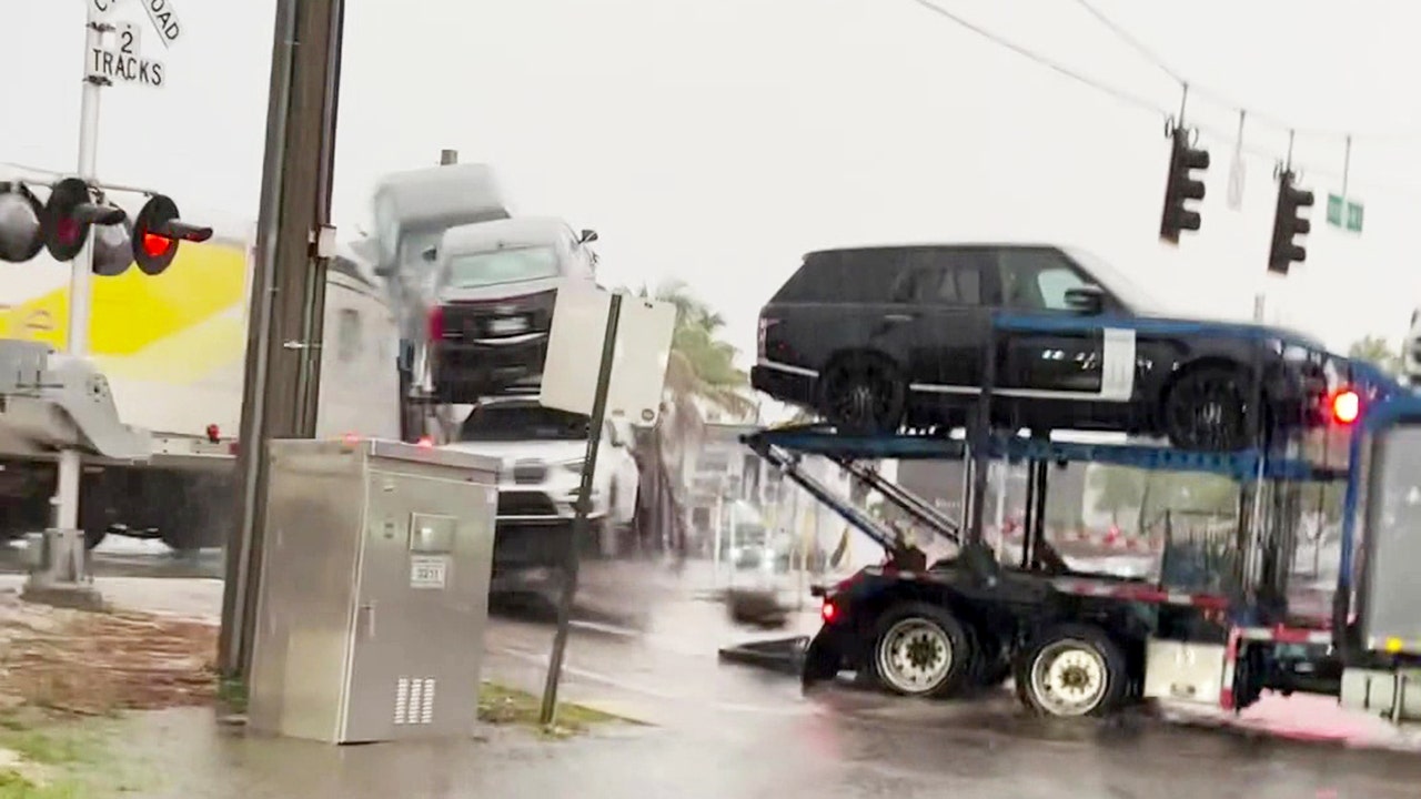 Witness video Brightline passenger train slams into car hauler