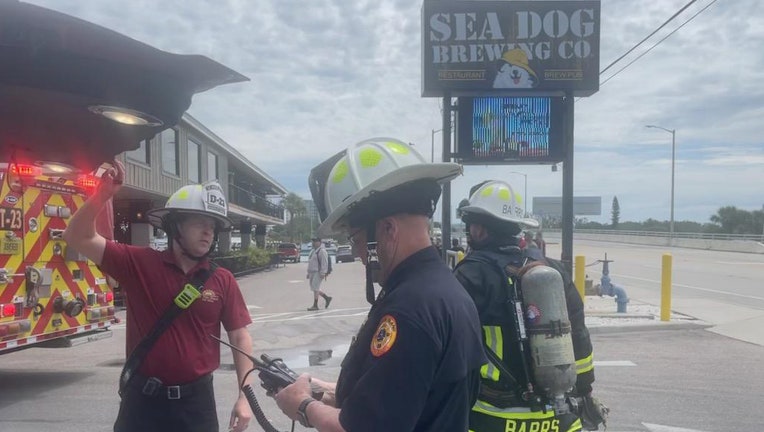 Firefighters outside of Sea Dog Brewing Company in Treasure Island. 