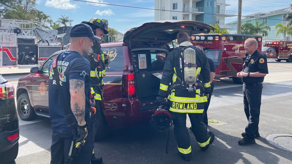 Firefighters outside of Sea Dog Brewing Company in Treasure Island.