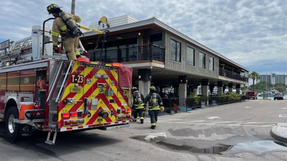 Fire truck and crew outside of Sea Dog Brewing Company.