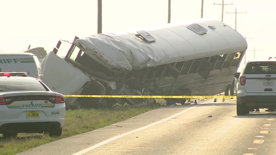 One person was killed and four others were injured in a crash between a semi-tanker truck and a grove worker bus in Polk County. 