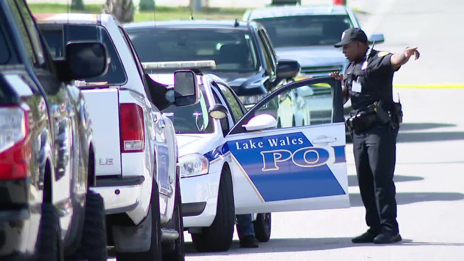 Lake Wales police officers outside fatal hostage scene.