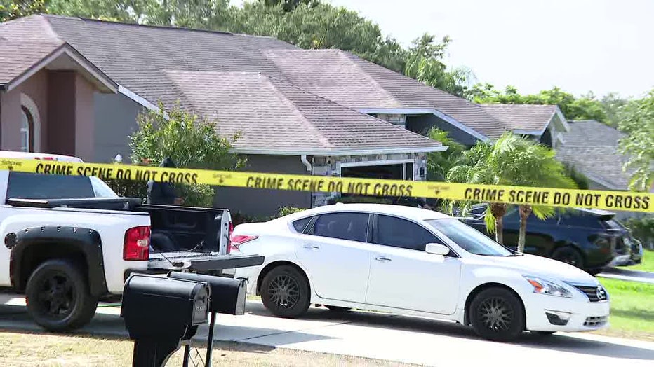 Crime scene tape outside of a home where a hostage situation turned fatal early Monday morning.
