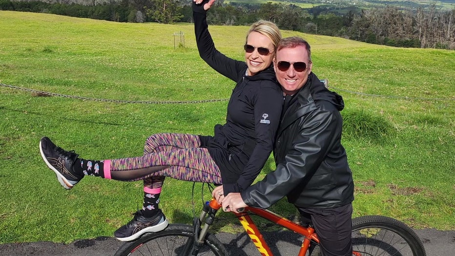 The Lundbergs riding a bike.