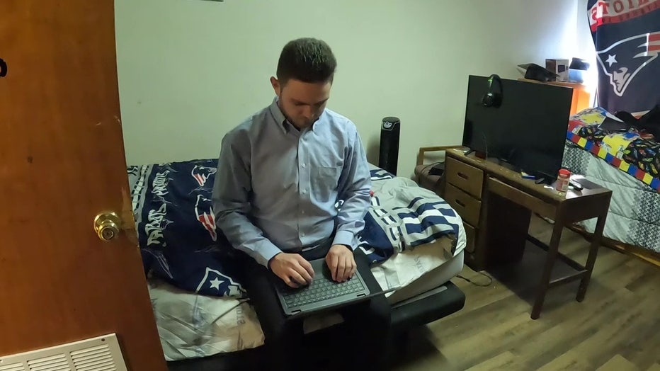 Shia Farmer working on a computer. 