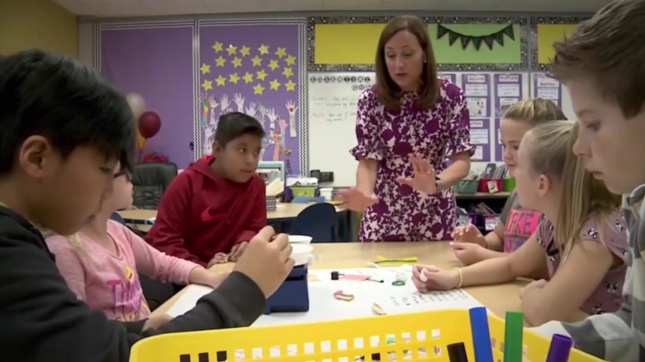 File: Teacher and students. 