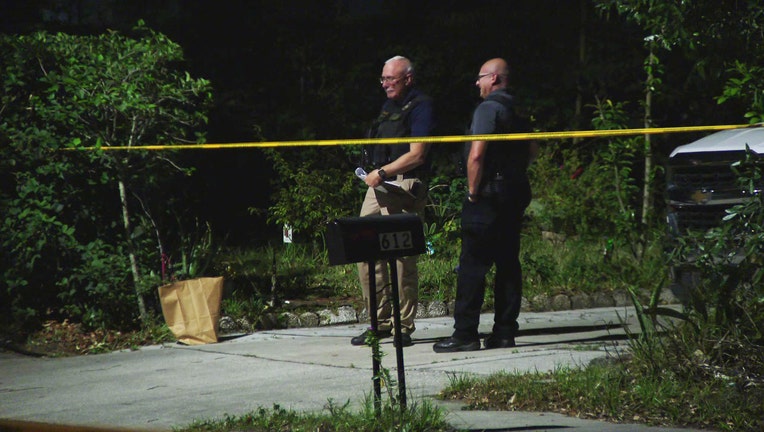 Investigators at the scene of a double shooting in Tarpon Springs.