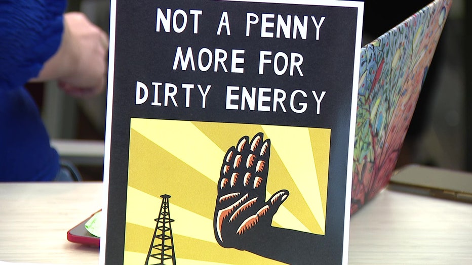 File: Protesters call for lower prices and more sustainable energy resources.