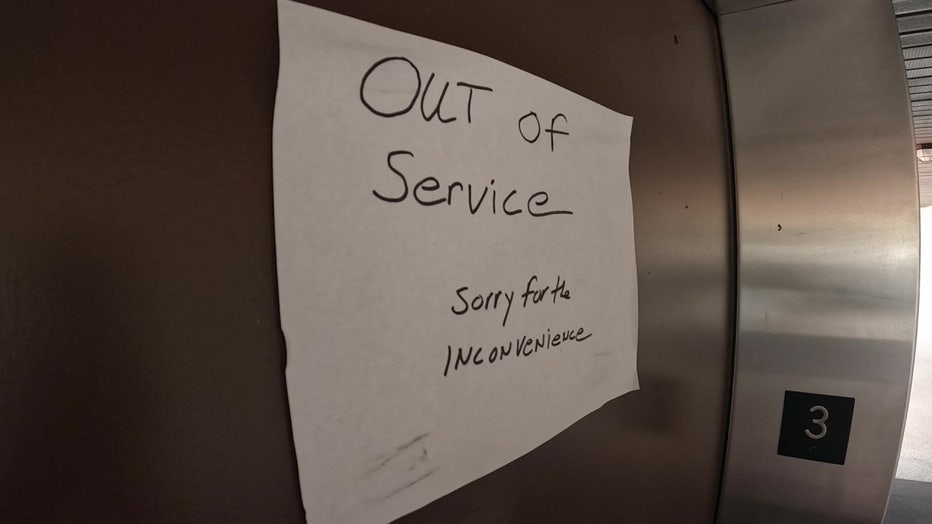 File: An elderly couple is trapped in their apartment since the elevator is out of service.