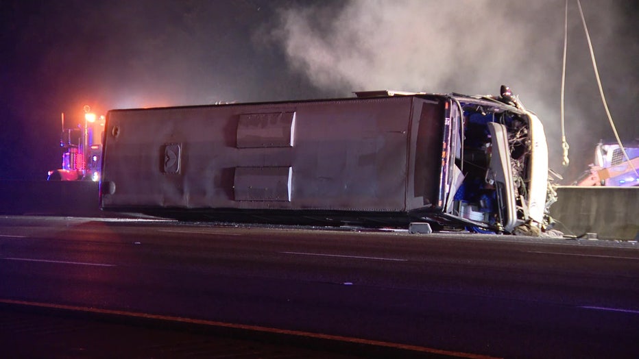 Overturned Greyhound bus on I-75 near Wesley Chapel. 