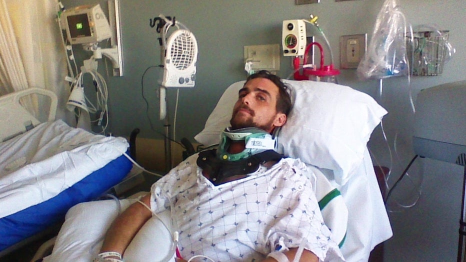 Jared Ramella in hospital bed following motorcycle crash. 