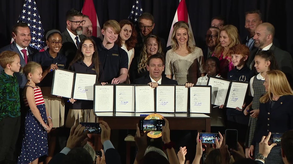 Ron DeSantis signs series of bills in Tampa.