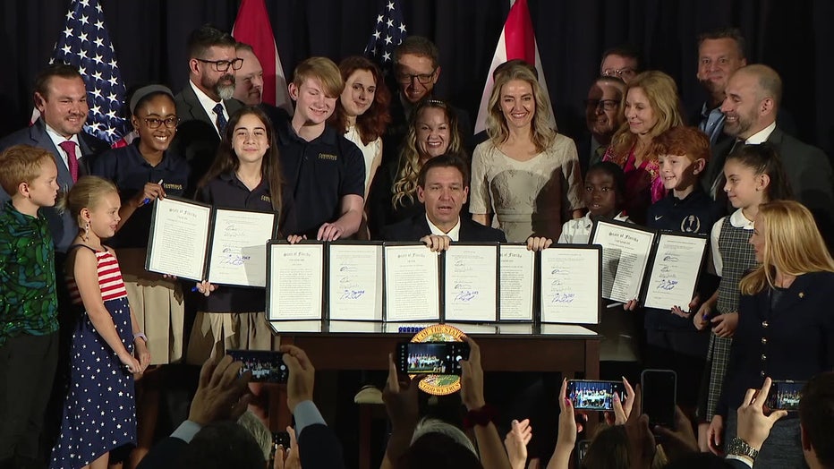 Ron DeSantis signs series of bills in Tampa. 