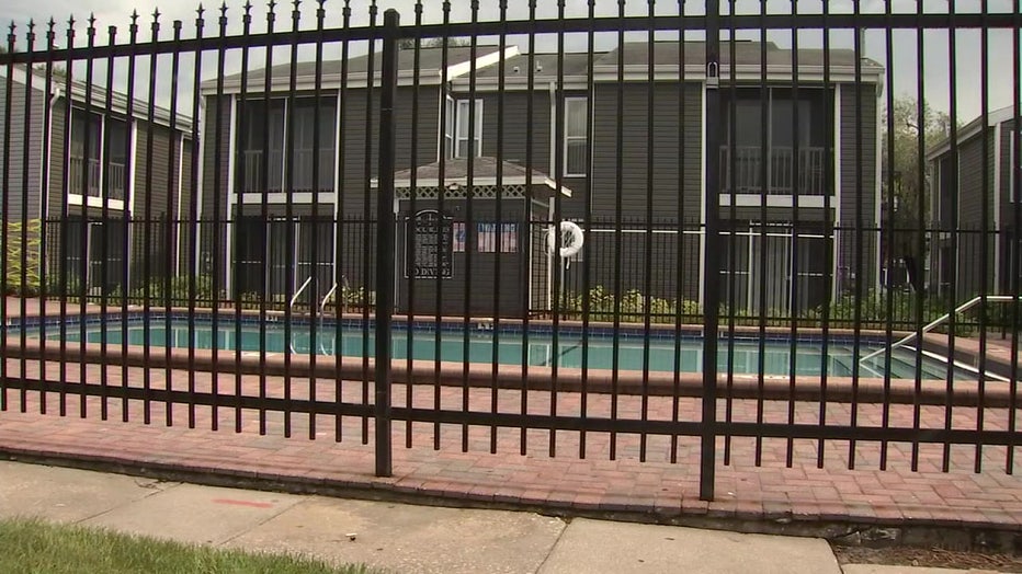 File: Swimming pool with fence