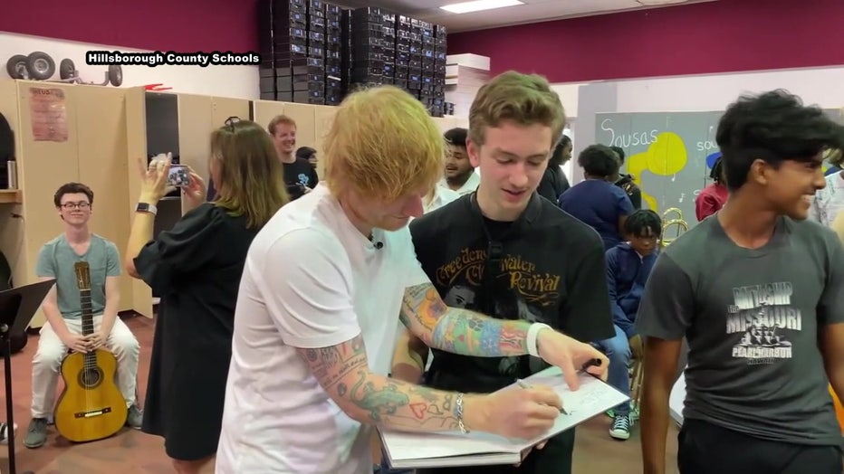 Ed Sheeran signed autographs for the students. 