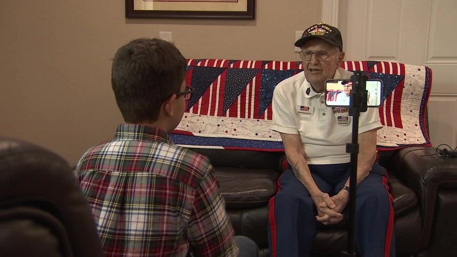 Isaac Shindore interviewing WWII vet. 