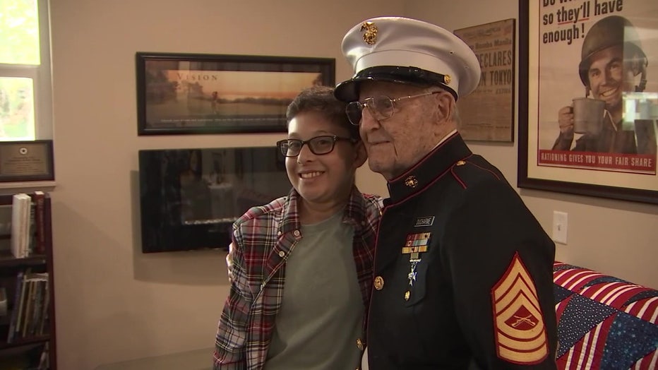 Isaac Shindore poses with WWII vet.