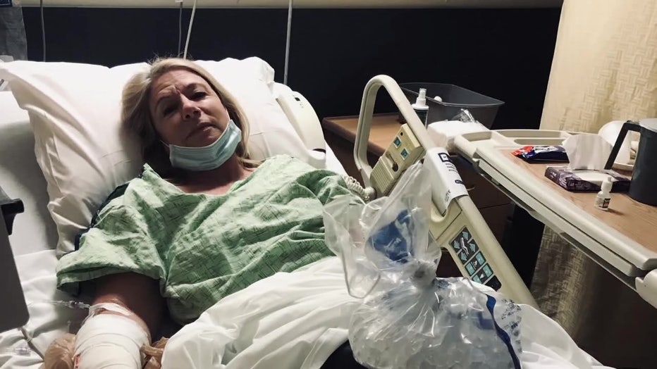 Janice Boulay in hospital bed following hit-and-run crash. 