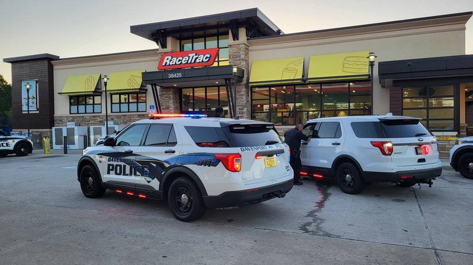 Police vehicles outside Davenport Racetrac. Image is courtesy of the Davenport Police Department. 