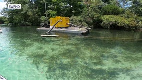 Divers hand-dredge Weeki Wachee River to improve conditions