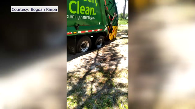 Garbage truck gets stuck in Nokomis neighborhood plagued by holes