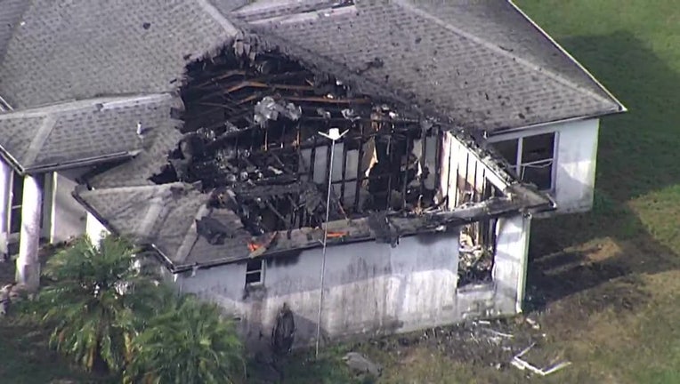 At least one person was killed in an early morning house fire in Palmetto. 