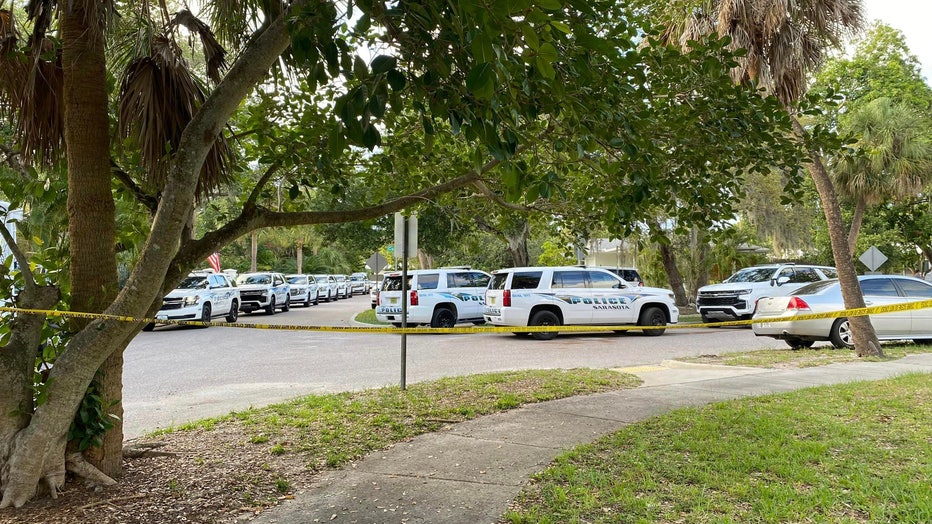 Police vehicles and crime scene tape outside of a SWAT situation in Sarasota. Image is courtesy of the Sarasota Police Department. 