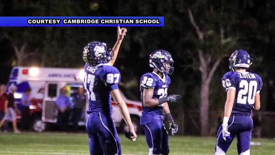 Cambridge Christian School football player on field.