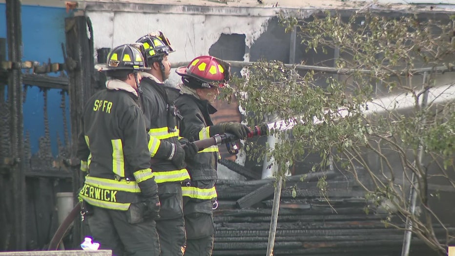 Firefighters outside a St. Petersburg structure fire. 