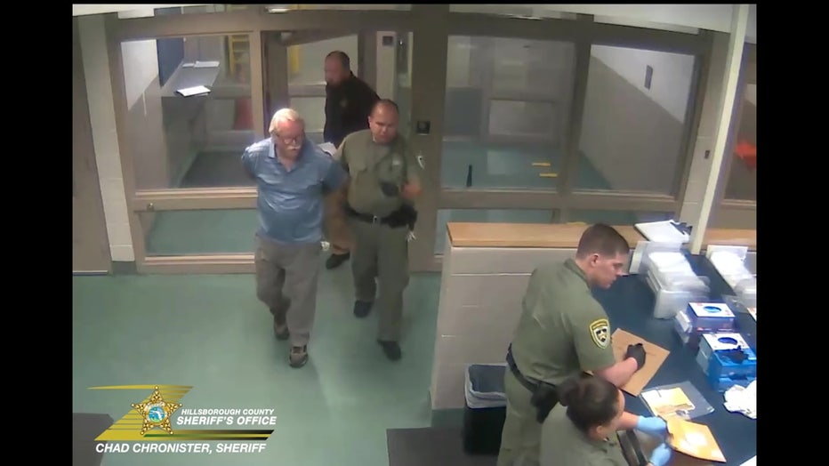 Donald Santini being booked into jail courtesy of the Hillsborough County Sheriff's Office. 