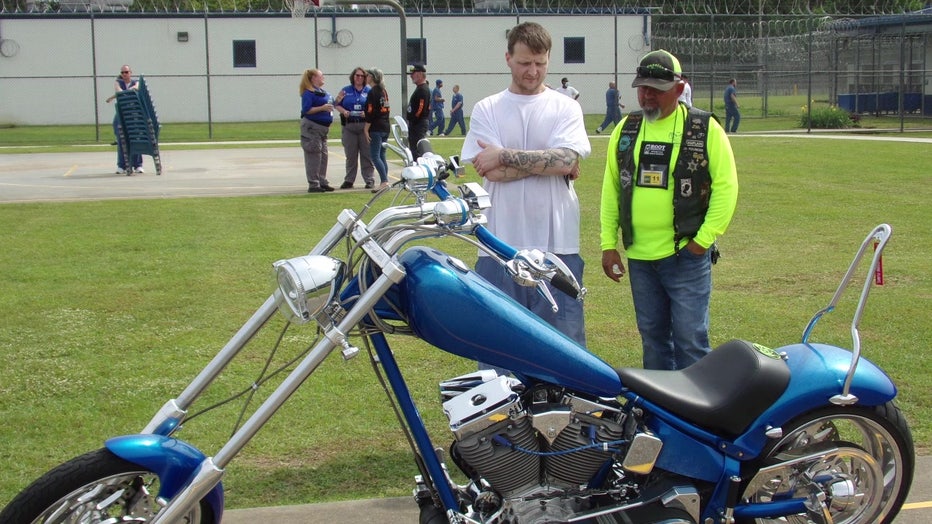 The couple spreads their faith and shows their love of cycling with inmates.