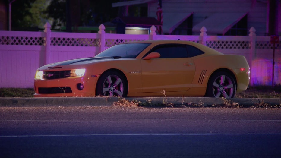 A yellow Camaro stopped near the victim and one driver is cooperating with the investigation.