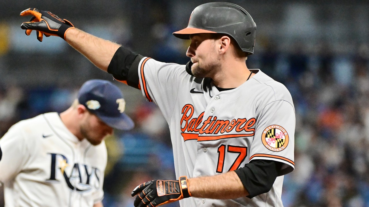 Adam Frazier of the Baltimore Orioles fields and throws to first News  Photo - Getty Images