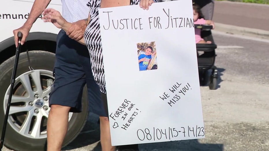 Yitzian Torres Garcia's family holds signing begging for justice. 