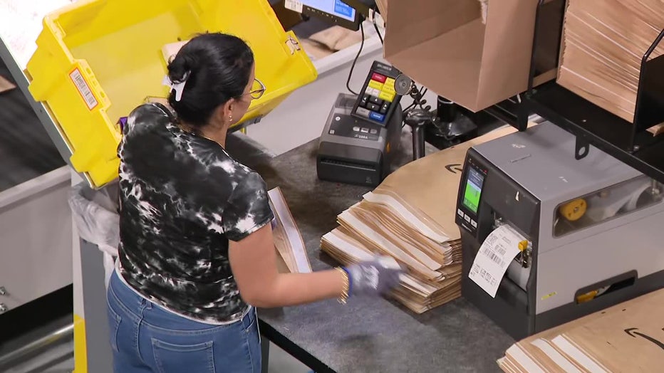 Amazon worker inside Temple Terrace warehouse. 