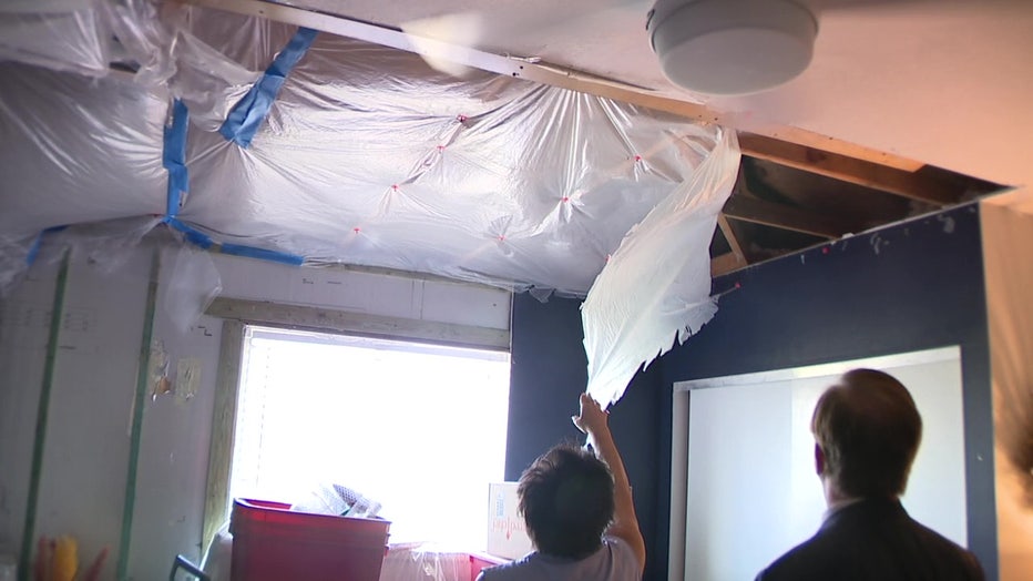 There were large holes in the ceiling after the hurricane went over the home.