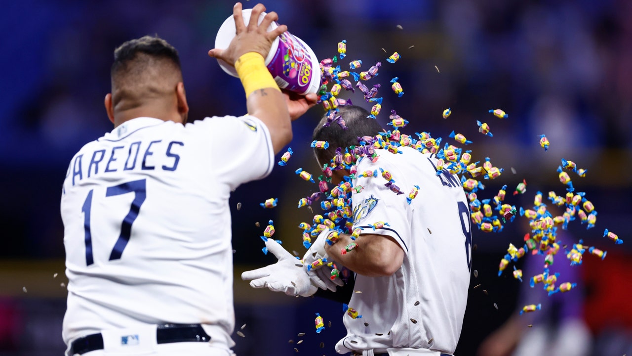 Elias Diaz of the Colorado Rockies celebrates with Brendan Rodgers News  Photo - Getty Images
