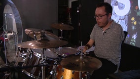 Faith In Action: Tampa pastor born without left arm, right hand shares passion for faith and music