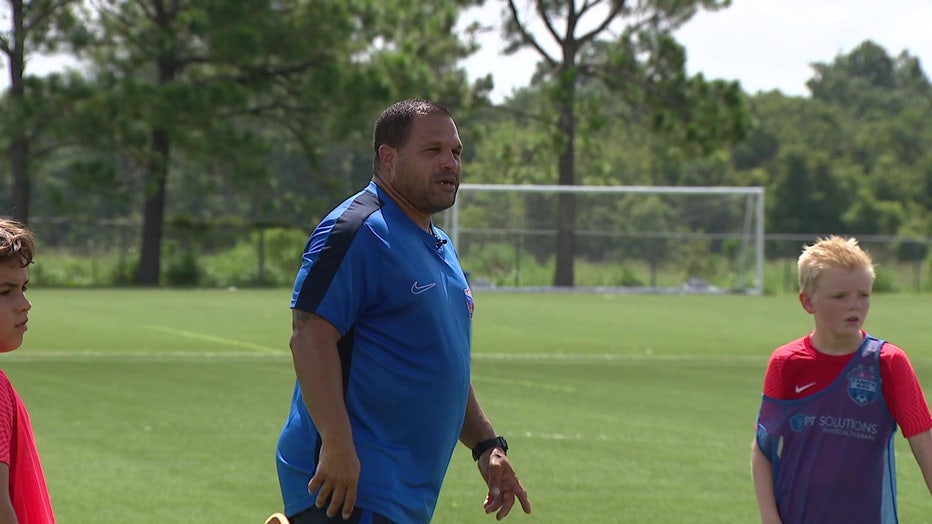 Carlos Marin coaching youth soccer.