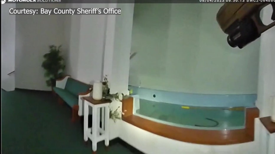 Bodycam video shows the baptistry pool in which an accused burglar says he baptized himself after breaking in. Image is courtesy of the Bay County Sheriff's Office.
