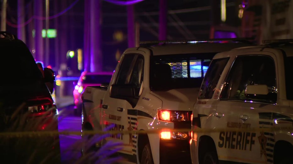 HCSO vehicles outside a Town 'n' Country apartment complex where a man barricaded himself inside after allegedly shooting a bondsman serving a warrant.