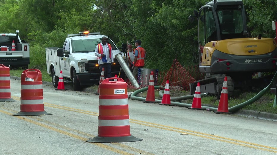 Crews repaired the road after a wastewater spill, but residents are concerned about the water quality.