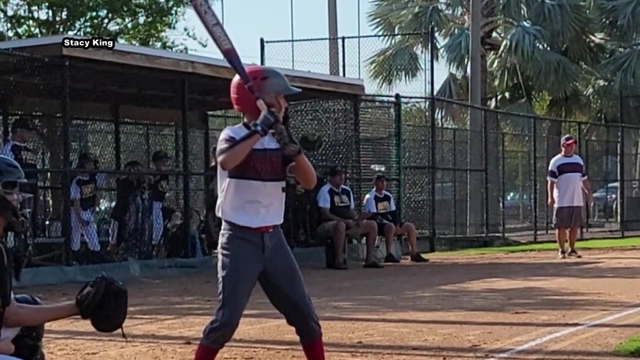 Colton King playing baseball.