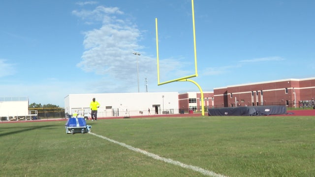 Robots invading football fields lend a helping hand