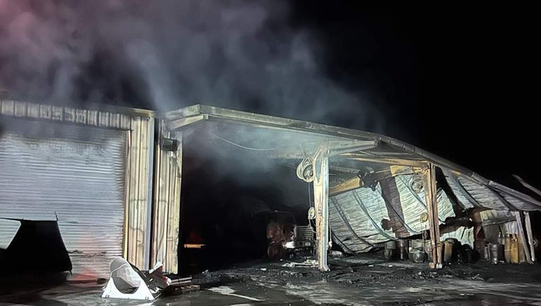 Titan Concrete on Gene Green Road in northeast Venice was engulfed in flames.